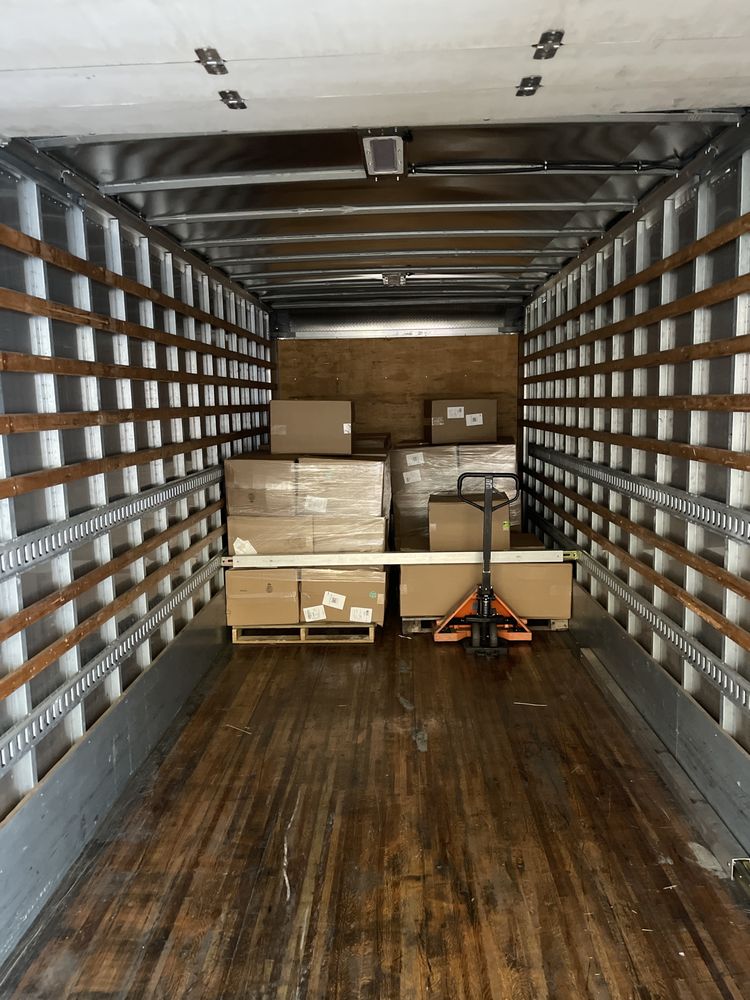 Cargo Taxi box truck at loading dock
